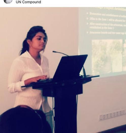 Sanali Jayalath presenting environmental project work to an audience