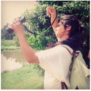 Sanali photographing wildlife outdoors